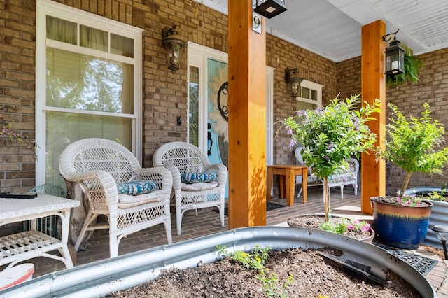 view of patio featuring covered porch
