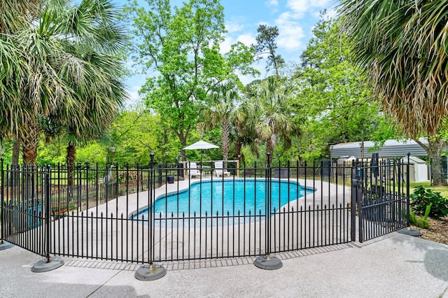 view of pool with fence, a patio, and a fenced in pool