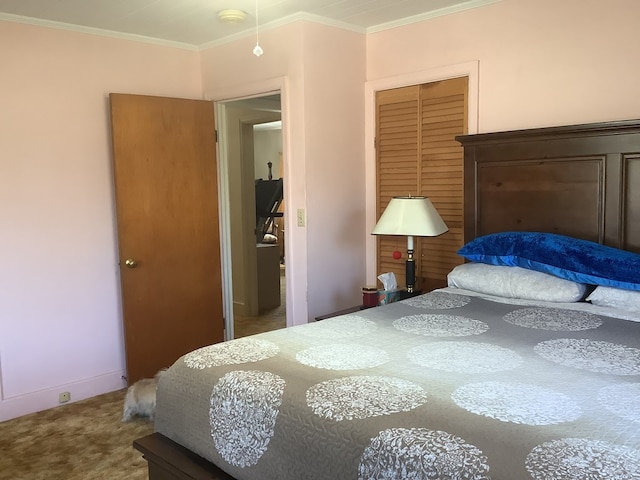 bedroom featuring carpet floors and ornamental molding