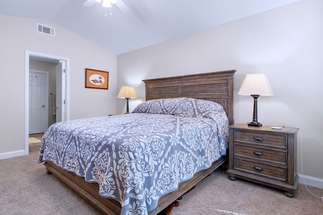 carpeted bedroom featuring a ceiling fan, lofted ceiling, visible vents, and baseboards