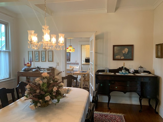 dining space with beam ceiling, an inviting chandelier, ornamental molding, wood finished floors, and coffered ceiling