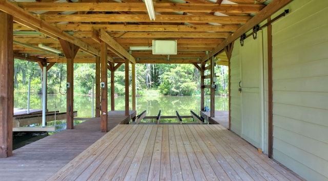 wooden deck featuring a boat dock