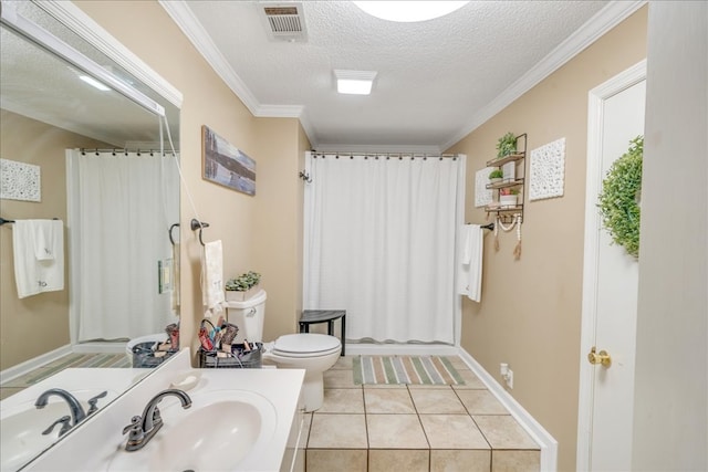 bathroom featuring crown molding, toilet, tile patterned flooring, and a textured ceiling