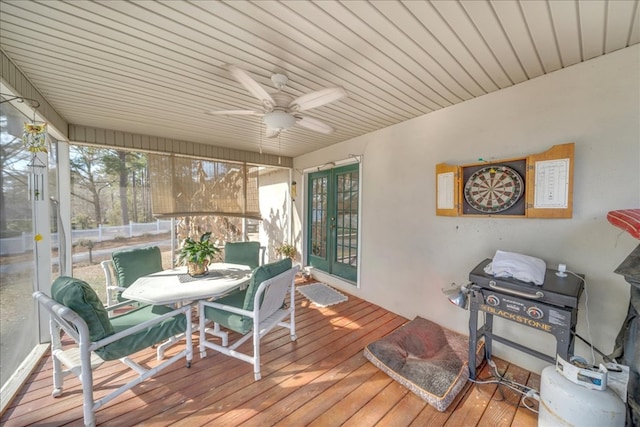 sunroom / solarium with ceiling fan