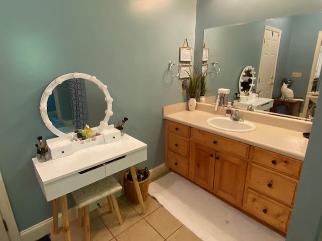 bathroom with vanity and tile patterned flooring