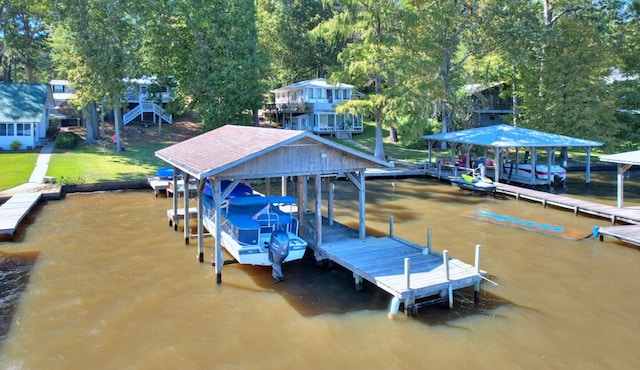 dock area featuring a water view