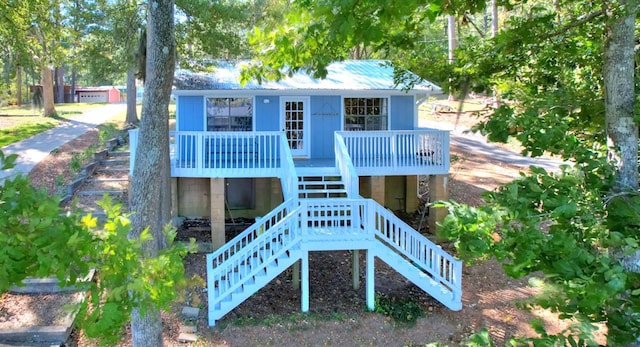 back of property with a deck