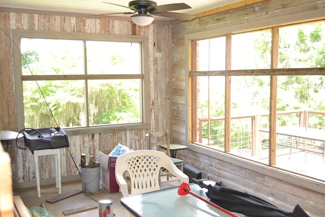 375 Flintside Dr, Cobb, GA 31735 - bathroom featuring wooden walls, a ceiling fan, and plenty of natural light