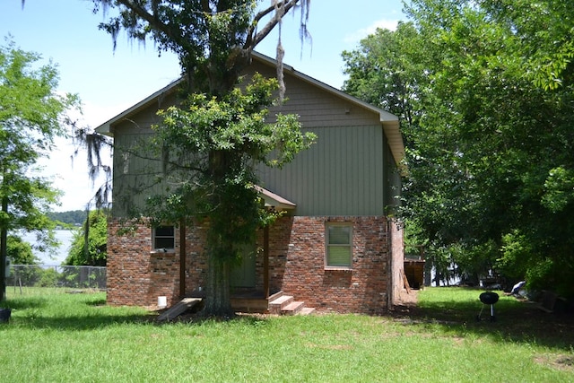 375 Flintside Dr, Cobb, GA 31735 - view of home's exterior with brick siding