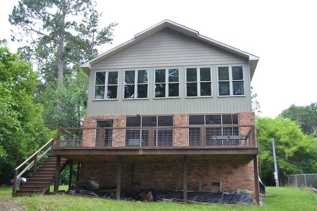 375 Flintside Dr, Cobb, GA 31735 - back of house featuring brick siding, stairs, and a deck