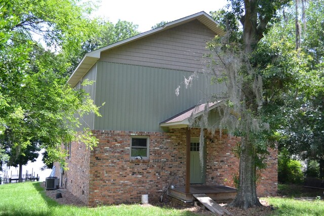 375 Flintside Dr, Cobb, GA 31735 - view of home's exterior with central air condition unit and brick siding