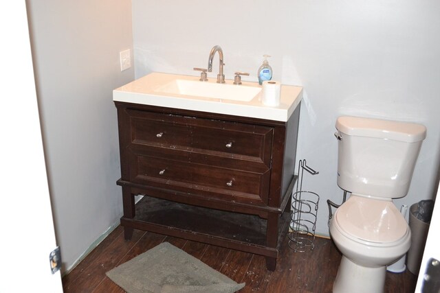 375 Flintside Dr, Cobb, GA 31735 - bathroom with toilet, wood finished floors, and vanity