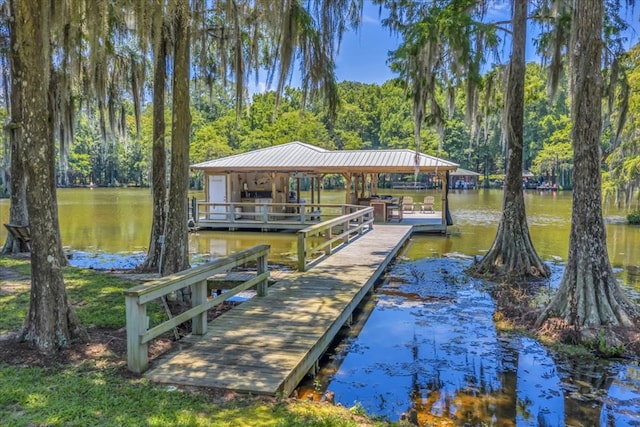 115 N Cedar Creek Rd, Cordele, GA 31015 - dock featuring a forest view and a water view