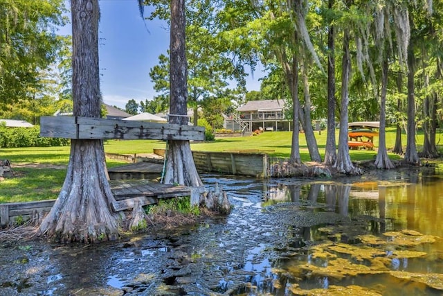 115 N Cedar Creek Rd, Cordele, GA 31015 - dock area featuring a lawn and a water view