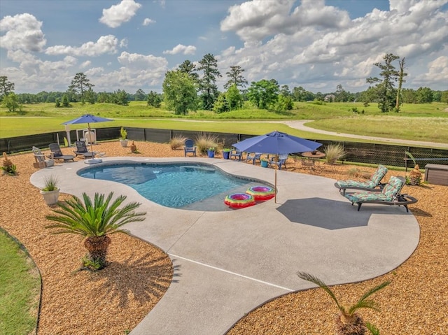 1942 Antioch Rd, Cordele, GA 31015 - view of swimming pool featuring a patio area and a fenced backyard