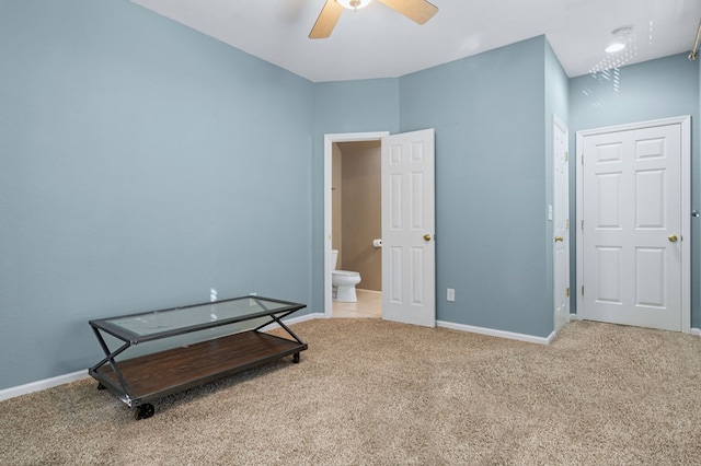 interior space featuring ceiling fan