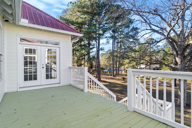 wooden terrace featuring french doors