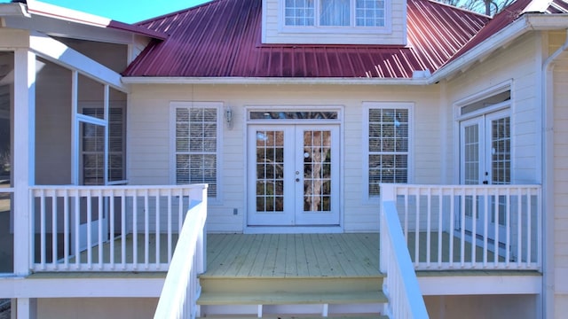 doorway to property with french doors and a wooden deck