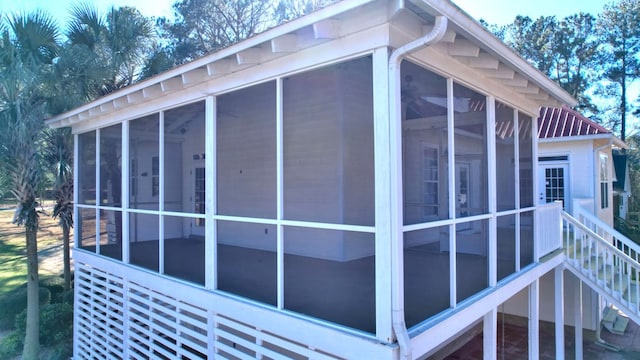 view of home's exterior featuring a sunroom