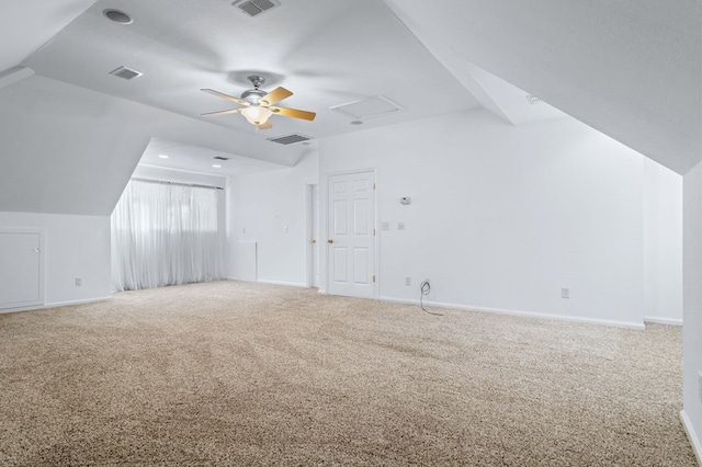 bonus room with carpet floors, ceiling fan, and vaulted ceiling