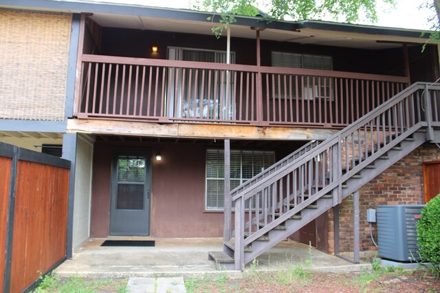 101F Country Club Dr, Americus, GA 31709 - back of property with stairs and central AC