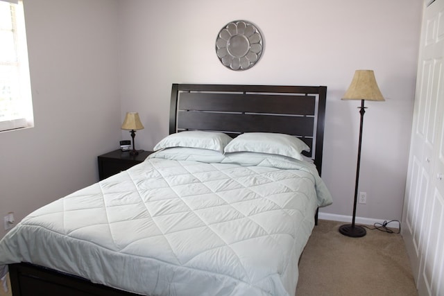 101F Country Club Dr, Americus, GA 31709 - carpeted bedroom featuring baseboards