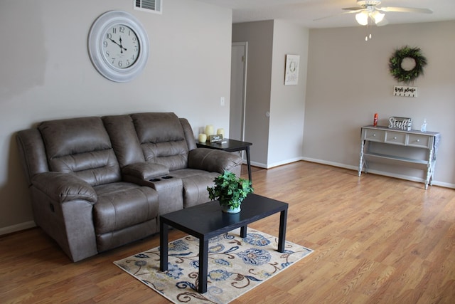 101F Country Club Dr, Americus, GA 31709 - living room with a ceiling fan, light wood-style flooring, and baseboards