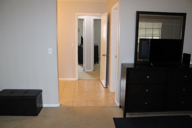 101F Country Club Dr, Americus, GA 31709 - hallway with light colored carpet, baseboards, and light tile patterned flooring