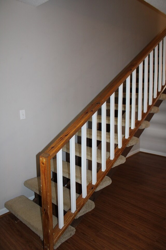 101F Country Club Dr, Americus, GA 31709 - stairway with wood finished floors and baseboards