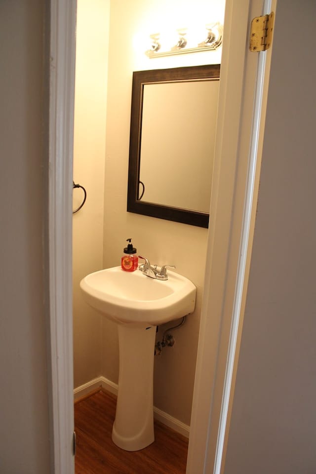 101F Country Club Dr, Americus, GA 31709 - bathroom featuring wood finished floors and baseboards