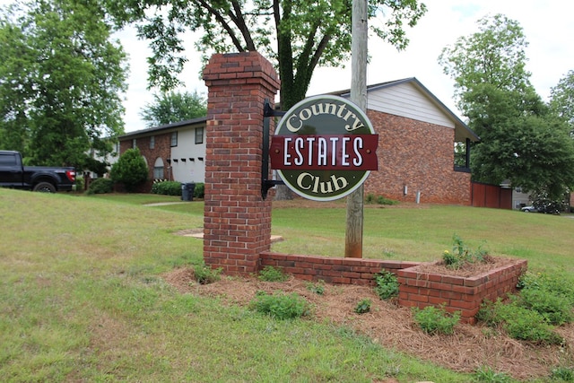 101F Country Club Dr, Americus, GA 31709 - community sign featuring a yard