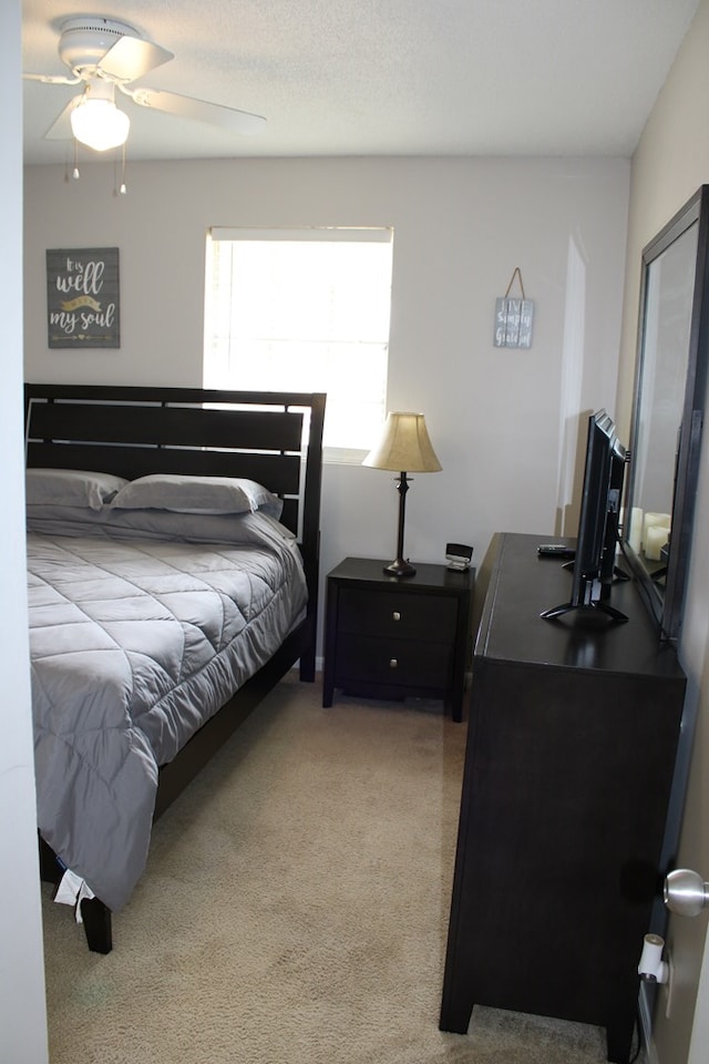 101F Country Club Dr, Americus, GA 31709 - bedroom with light colored carpet and ceiling fan