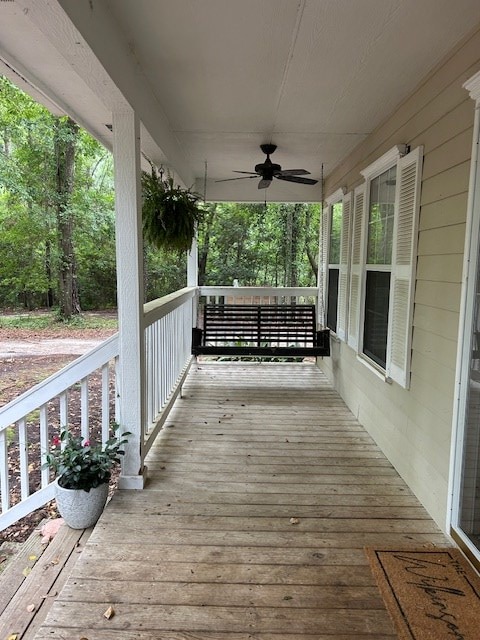 169 Wanda Rd, Cordele, GA 31015 - deck featuring covered porch and ceiling fan