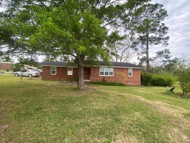 exterior space with a yard