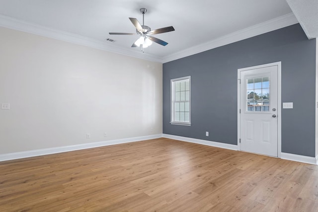 spare room with light hardwood / wood-style floors, ceiling fan, and ornamental molding