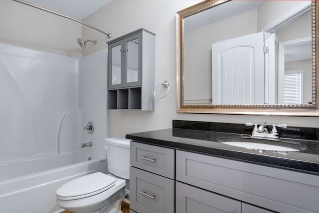 full bathroom featuring vanity, toilet, and shower / bathtub combination