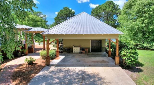 exterior space with a carport