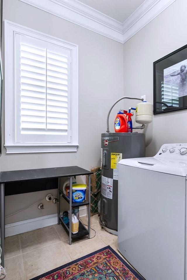 washroom featuring crown molding, light tile patterned floors, washer / dryer, and electric water heater