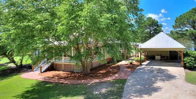 exterior space featuring a carport