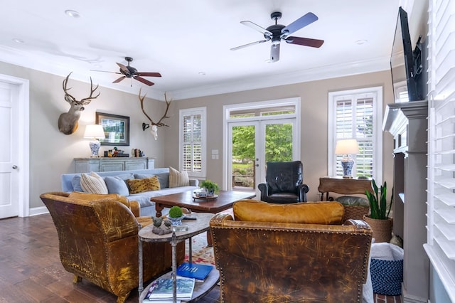 living room featuring ornamental molding, dark hardwood / wood-style floors, ceiling fan, and french doors