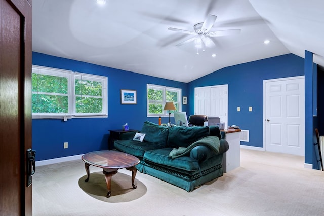 living room with light carpet, vaulted ceiling, visible vents, and baseboards