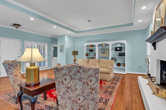 190 Scenic Rt, Cordele, GA 31015 - living room featuring wood finished floors, a brick fireplace, crown molding, recessed lighting, and baseboards