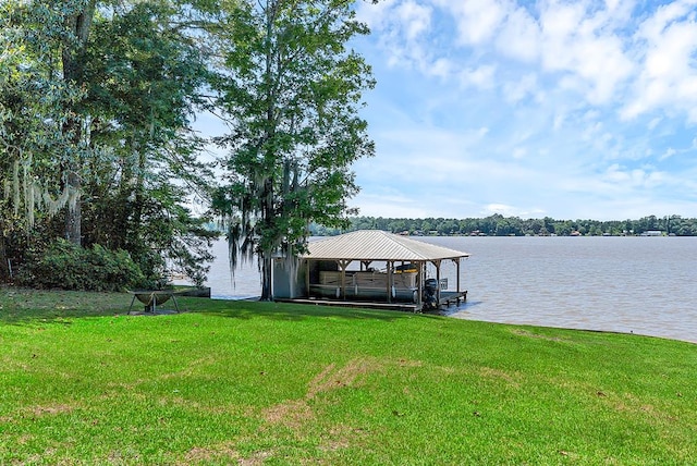 190 Scenic Rt, Cordele, GA 31015 - dock area with boat lift, a lawn, and a water view