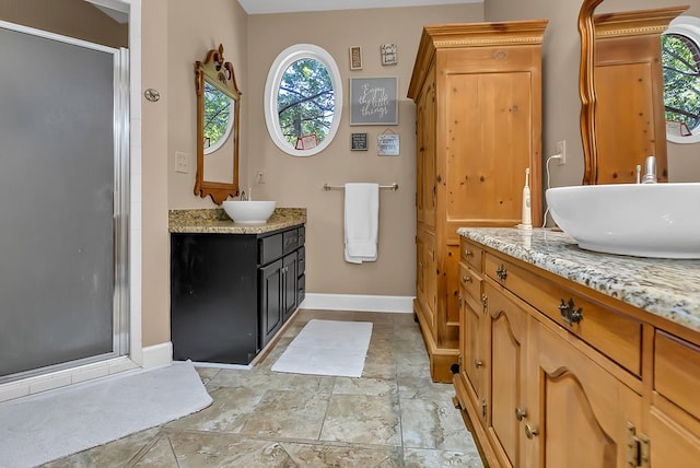 190 Scenic Rt, Cordele, GA 31015 - full bath featuring a shower stall, baseboards, vanity, and stone finish floors