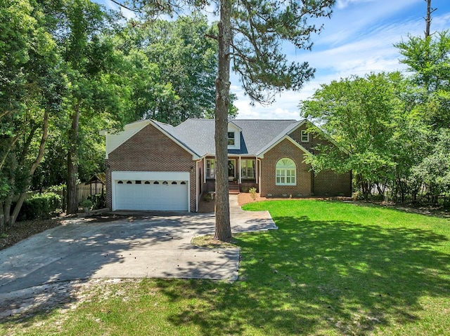 190 Scenic Rt, Cordele, GA 31015 - view of front of house featuring an attached garage, driveway, and brick siding