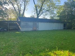 view of outdoor structure featuring a yard