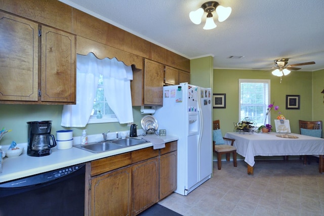 kitchen with white fridge with ice dispenser, a textured ceiling, black dishwasher, sink, and ceiling fan