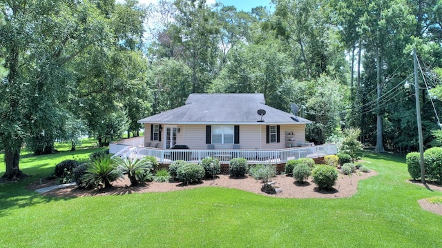 back of house featuring a yard