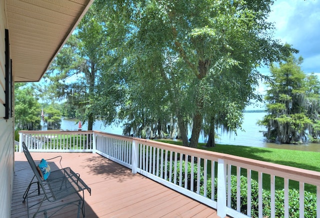 deck featuring a water view