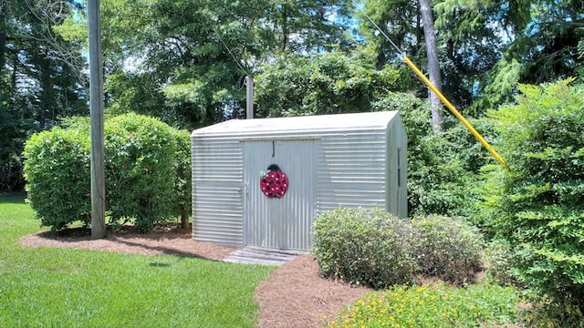 view of outdoor structure with a lawn